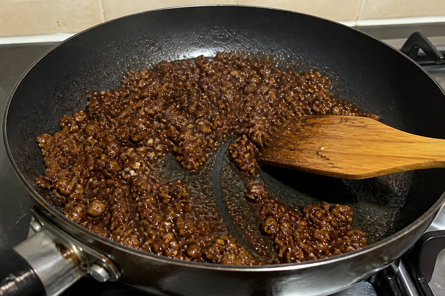 Browned minced beef coated in a shiny sticky gochujang glaze with almost no liquid left in the pan